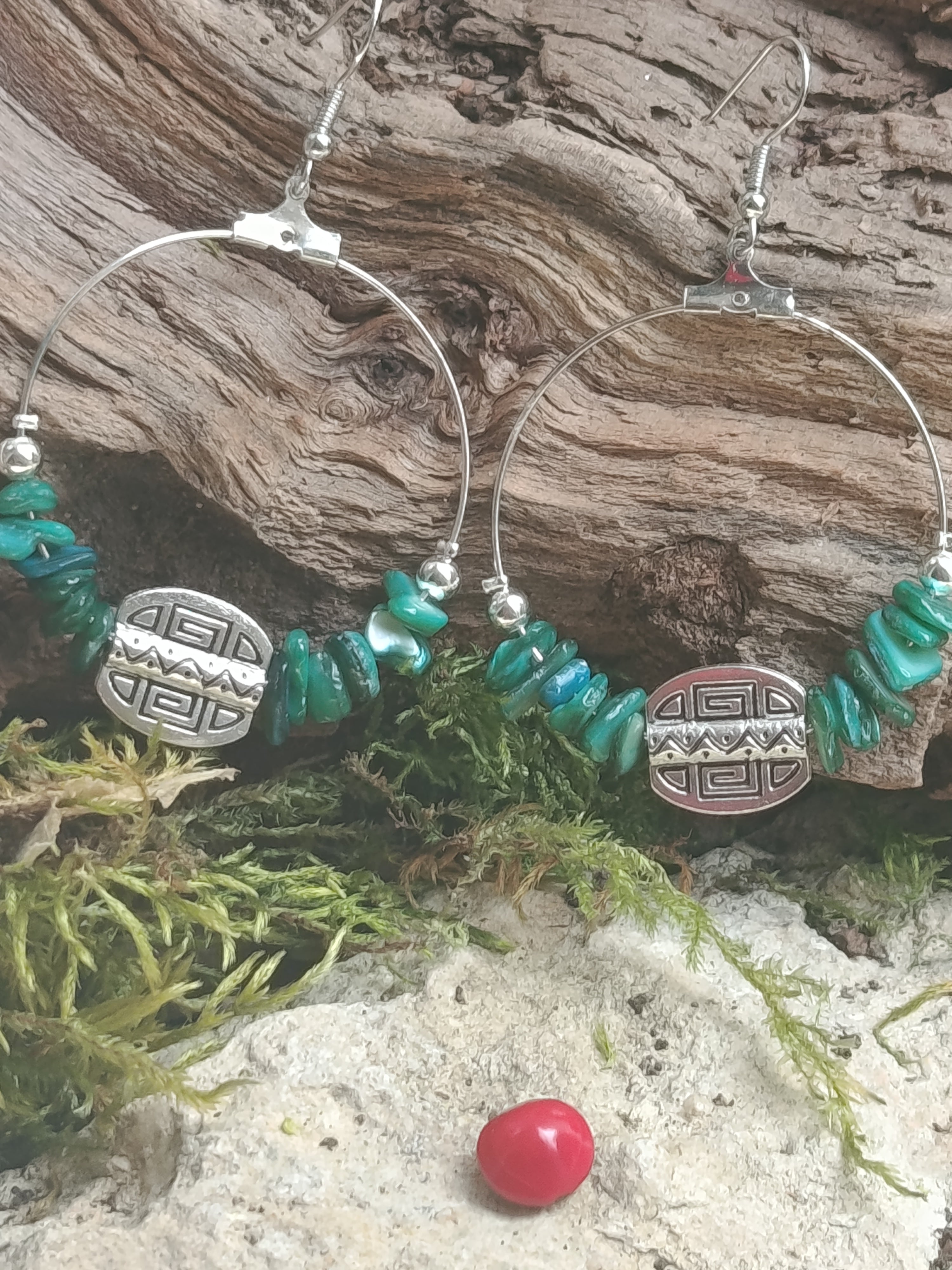 Boucles d'oreilles pierres et emblème